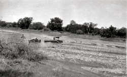 With the car through the river. 1920s 