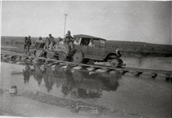 Floods in Heide-Tsumis. Motor car on railway line. March 1934 