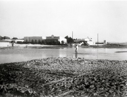Floods in Swakopmund. Swakop river railway bridge washed away during floods. 1931 
